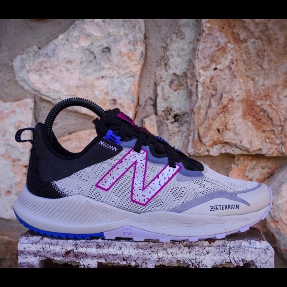 New balance size 7.5. Terrain/trail/hiking feel. Great shoes like new.